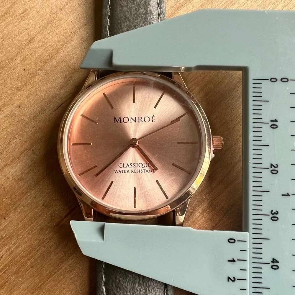 Monroe rose gold tone dress watch  NEW BATTERY